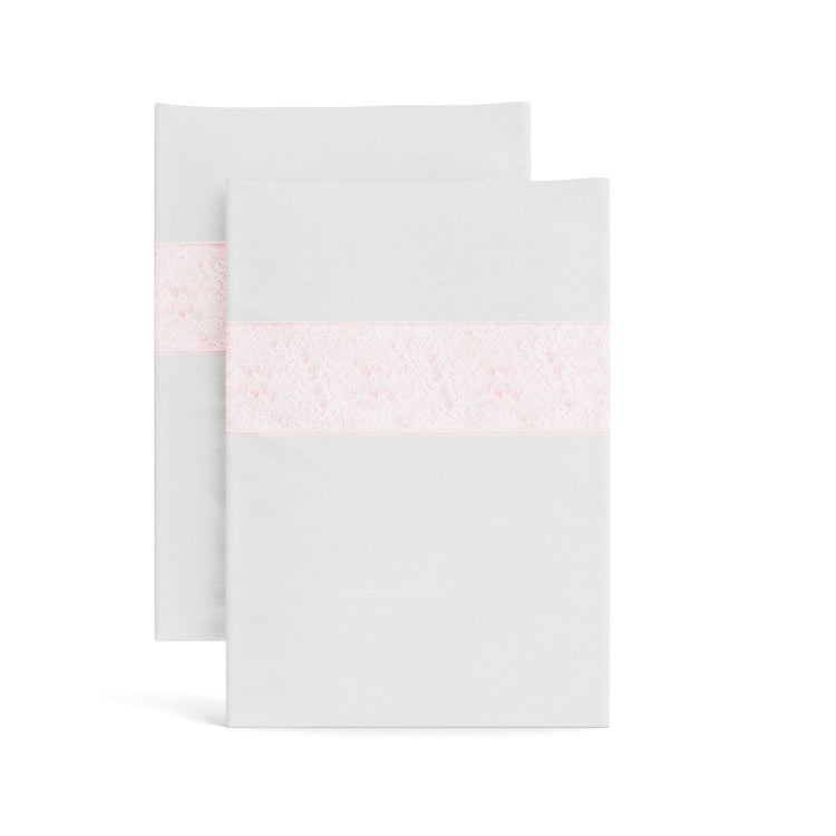 Stacked white Minaudiere pillowcases from the Judith Leiber Couture x Ann Gish collection, detailed with a light pink sequined border band that echoes the jeweled Minaudiere motif. - PCMIK‑WHI‑PIN PCMIS‑WHI‑PIN